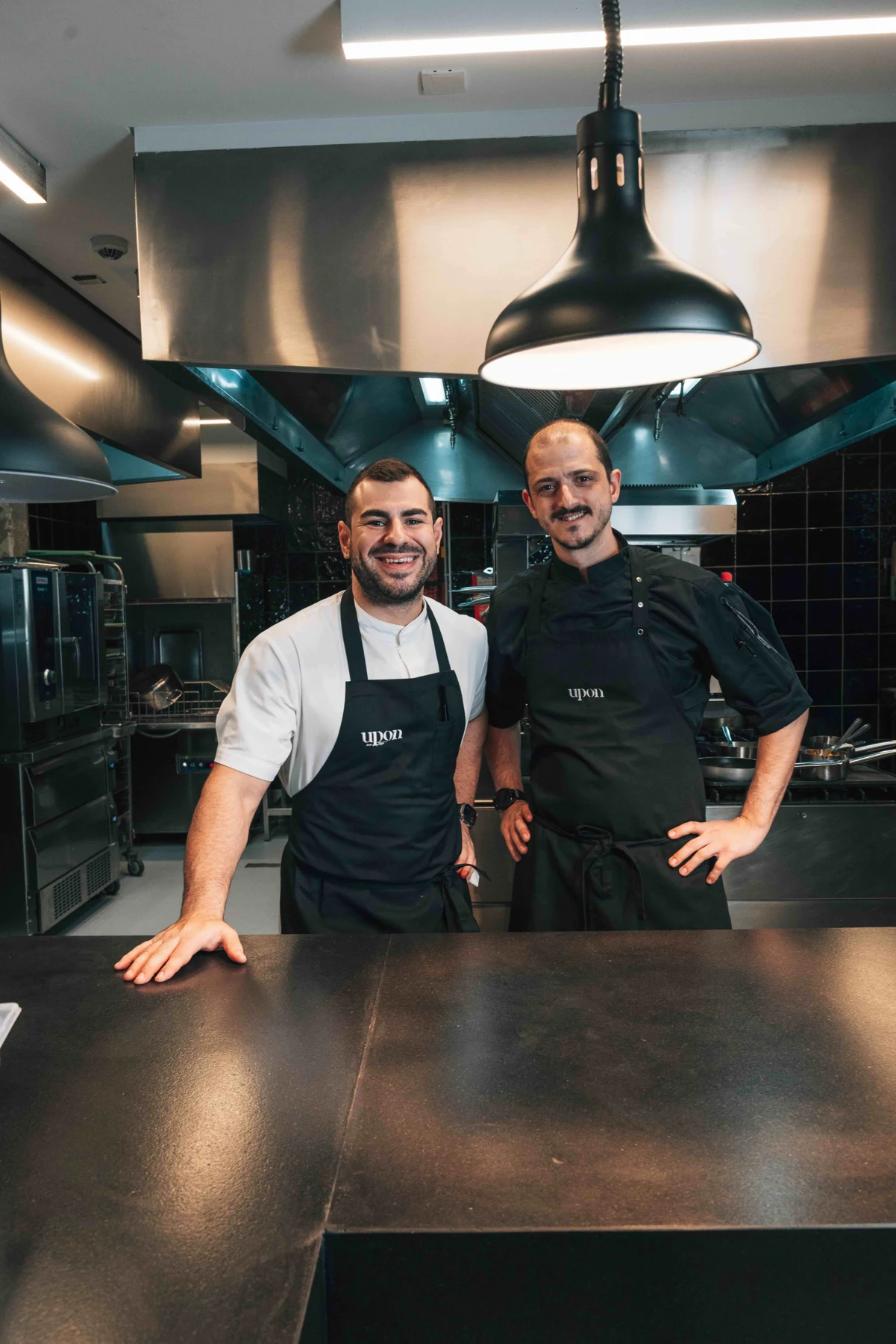 The UPON Paphos culinary team in the restaurant kitchen